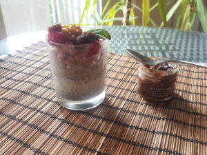 4 phases: powder base (hemp protein, cinnamon, quinoa, banana, grounded buckwheat, cardamome, ginger, sunflower and cacao seeds) + Chia pudding  with creamy toasted almond caramelized milk + crunchy muesli red fruit + Raspberries, fig marmalade with caramelized Macadamia walnuts, walnut and mint