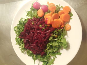 Rainbow superfoods: radish, red beets, rocket, carrots. Root vegetables and prebiotics are important for women's well-being in the first week of the menstrual cycle after the period