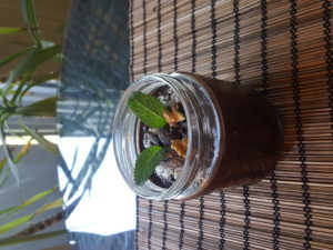 Cocoa custard with fig paste and creamy fresh pressed coconut coconut milk. Topping : grated coconut, cocoa nibs, moroccan mint