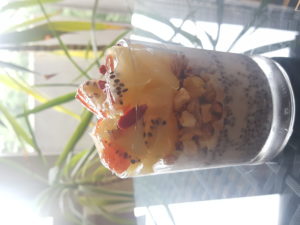 3 phases : creamy toasted caramelized almond milk chia pudding, crunchy apple and cranberry muesli and zeilan kiwi. Topping :goji berries, gratted coconut and strawberry marmalade 