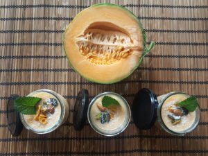 Melon custard. Soy iogurt, flowers greek premium honey,melon.Topping: dried mango, pistaccio, marroquin mint, almond, grated coconut