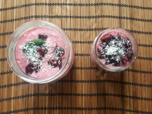 Raspberry custard. Soy iogurt, date syrope, raspberries. Topping : dried cranberries, aronia, dried peach, dried blueberries, grated coconut, marroquin mint 
