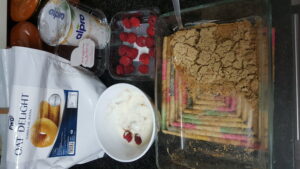 Cruspy oatmeal made with soy milk with raspberries and oat iogurt 