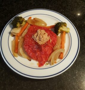 Tuna stuff tomato. Onion, carrot, broccoli