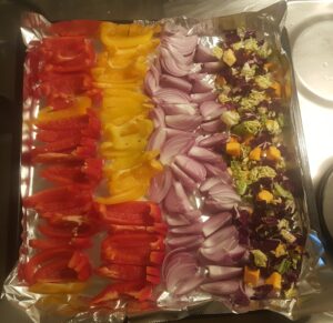 Vegetales on the oven for pizza 