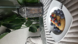 Healthy dessert with plenty of superfood properties: Apple compote, goji berries, blueberries