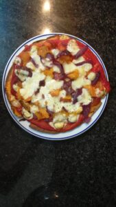 Home made thin mass and healthy pizza: red pepper, ognion, natural tomato, light cheese