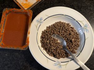 Lentils with “ñora” sauce 