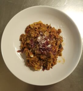 Rice Carvalho. Rice, fond de volaille, onion, viande séchée, peeled tomato, aubergine, zucchini, Catalan sausage